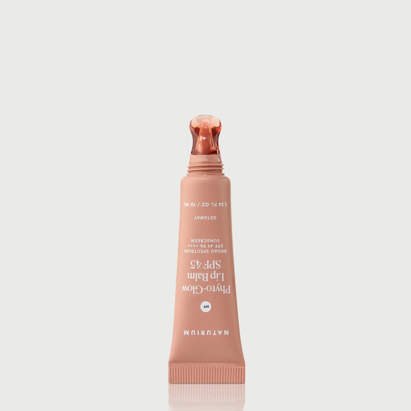 phyto-glow-lip-balm-spf-45-getaway-w7 NATR-10126_PhytoGlow_SPF_Getaway_primary_nocap_bonebkgd_1.webp