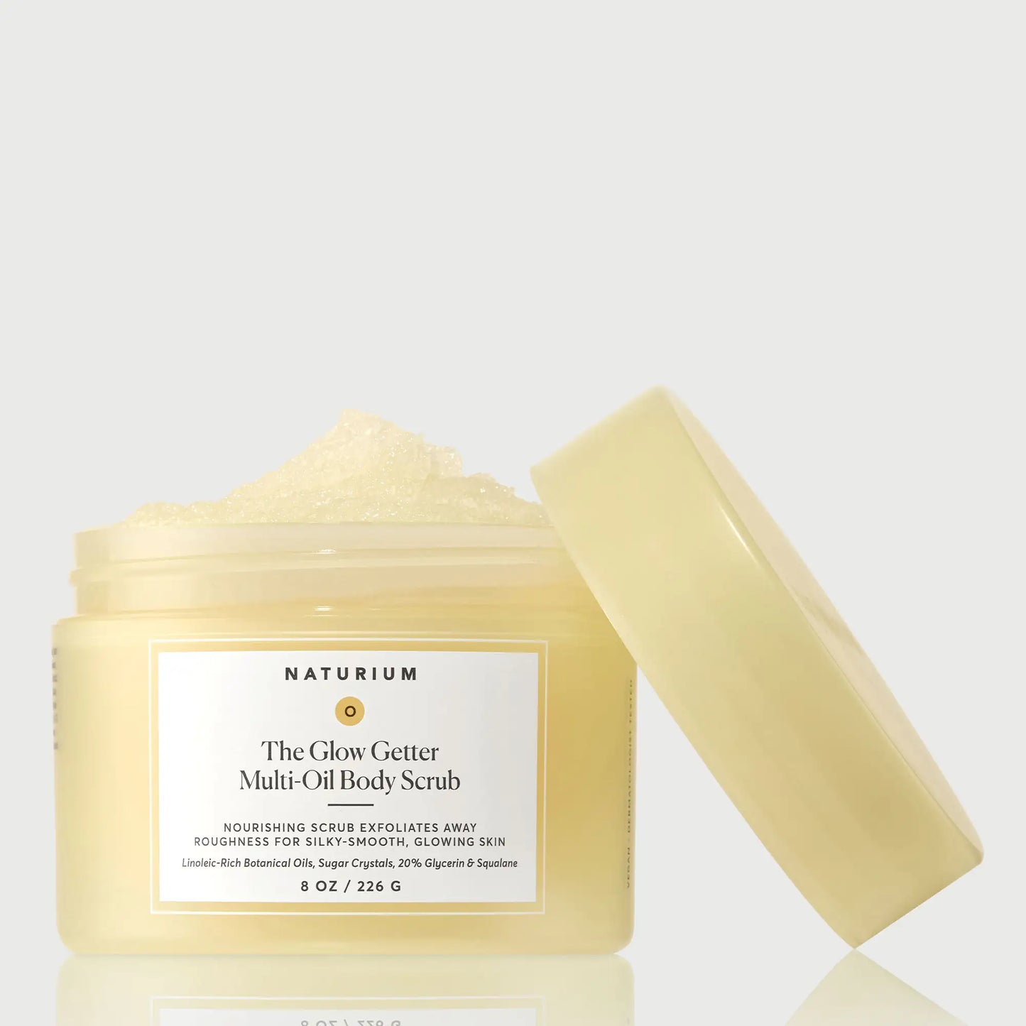 the-glow-getter-multi-oil-body-scrub-p9 NATR-40028-GlowGetter-Multi-Oil-Body-Scrub-Front-CapOff-bonebkgd.webp