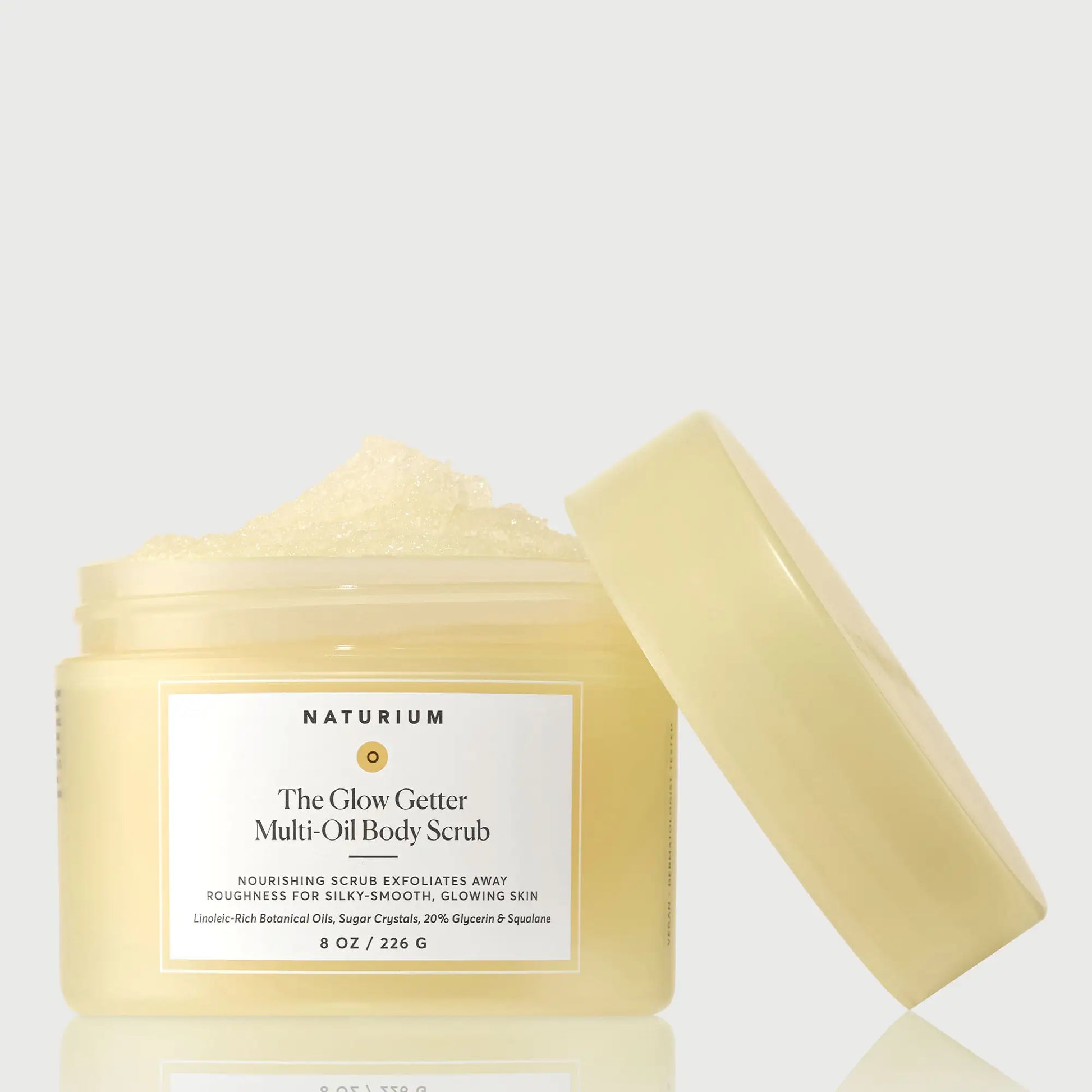 the-glow-getter-multi-oil-body-scrub-p9 NATR-40028-GlowGetter-Multi-Oil-Body-Scrub-Front-CapOff-bonebkgd.webp