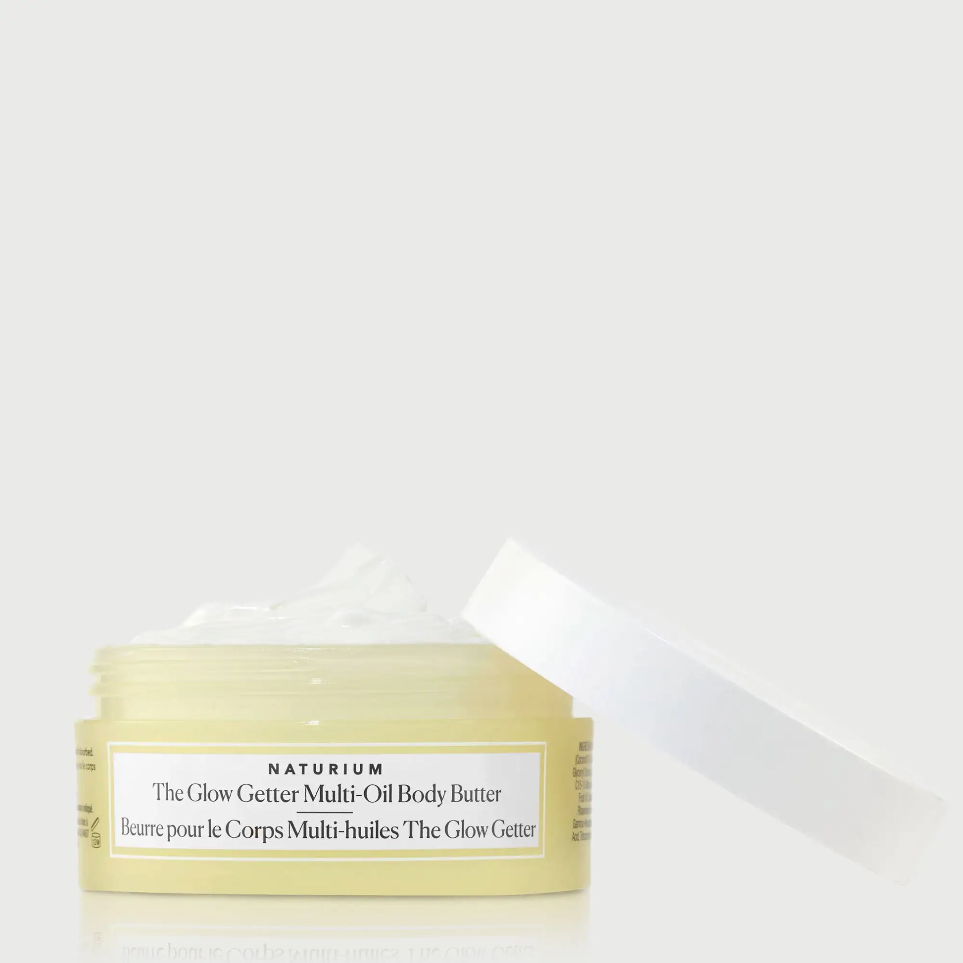 the-glow-getter-multi-oil-body-butter-travel-size-d1 NATR-40115_Glow-Getter-Body-Butter-Mini_front_capoff_bonebkgd.webp
