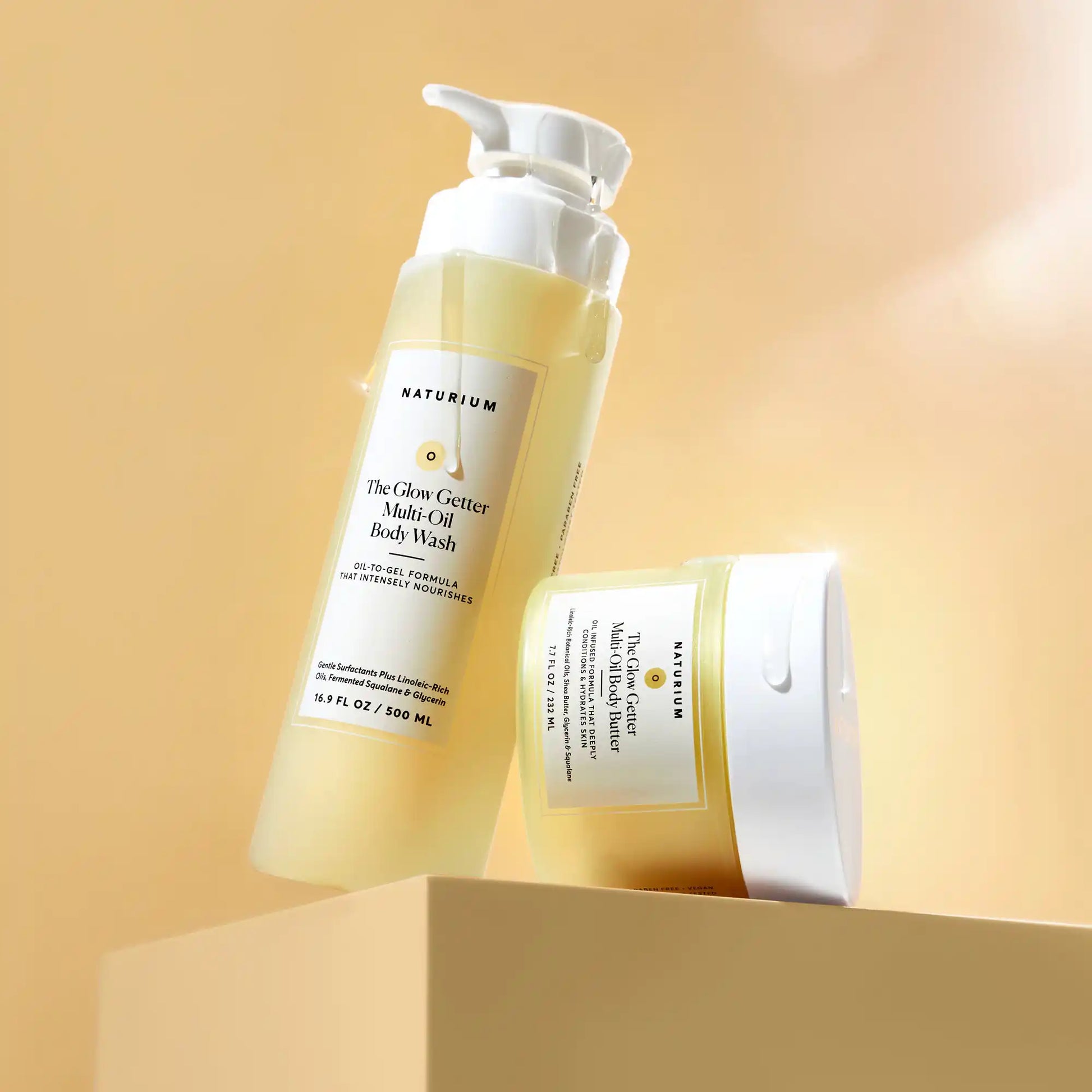 the-glow-all-out-body-bundle-r9 gg-bodybutter_1464-crop_revcolor_FL.webp